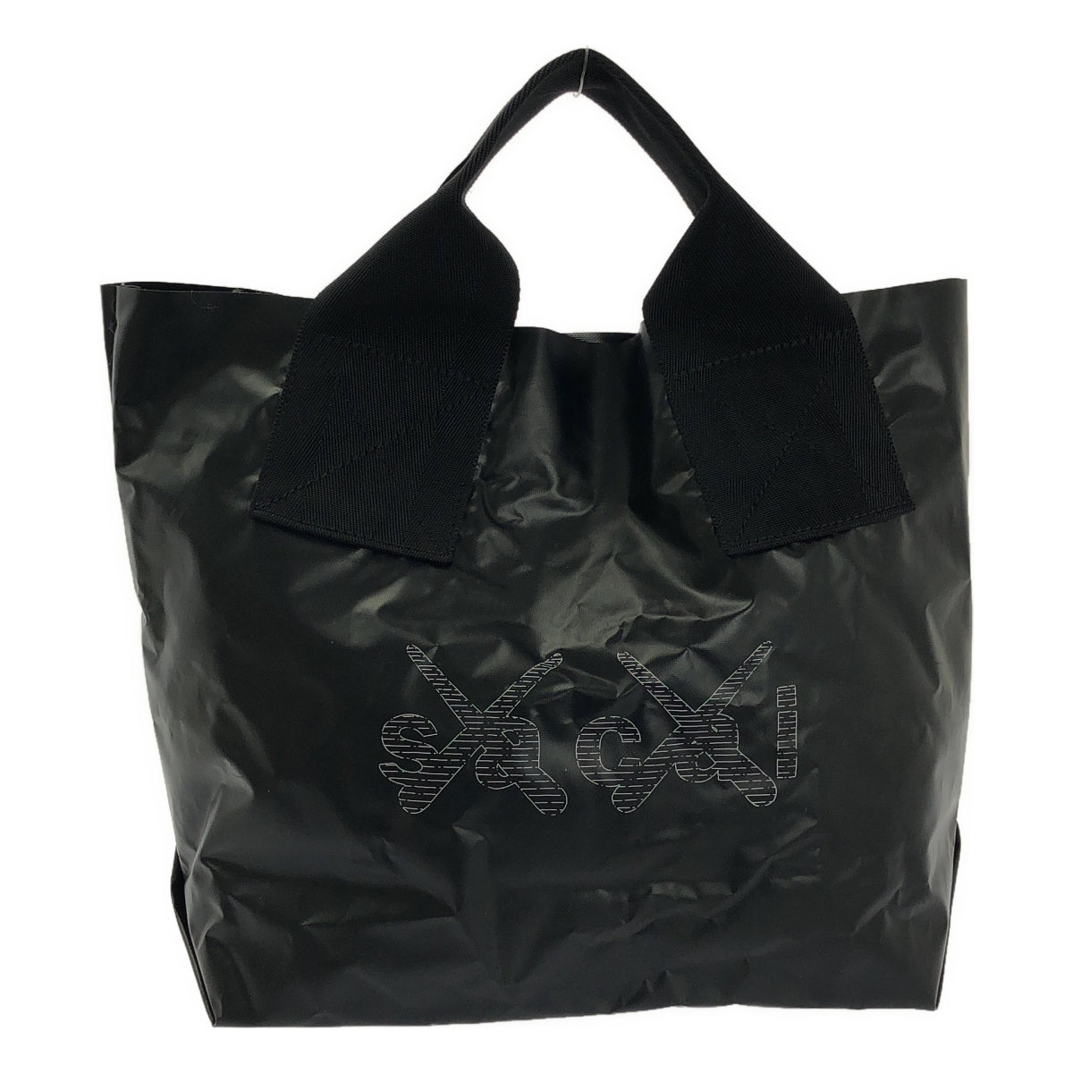 sacai x KAWS サカイ カウズ Print Tote Bag ブラック sacai / サカイ | × kaws Print Tote Bag トウキョウ ファースト