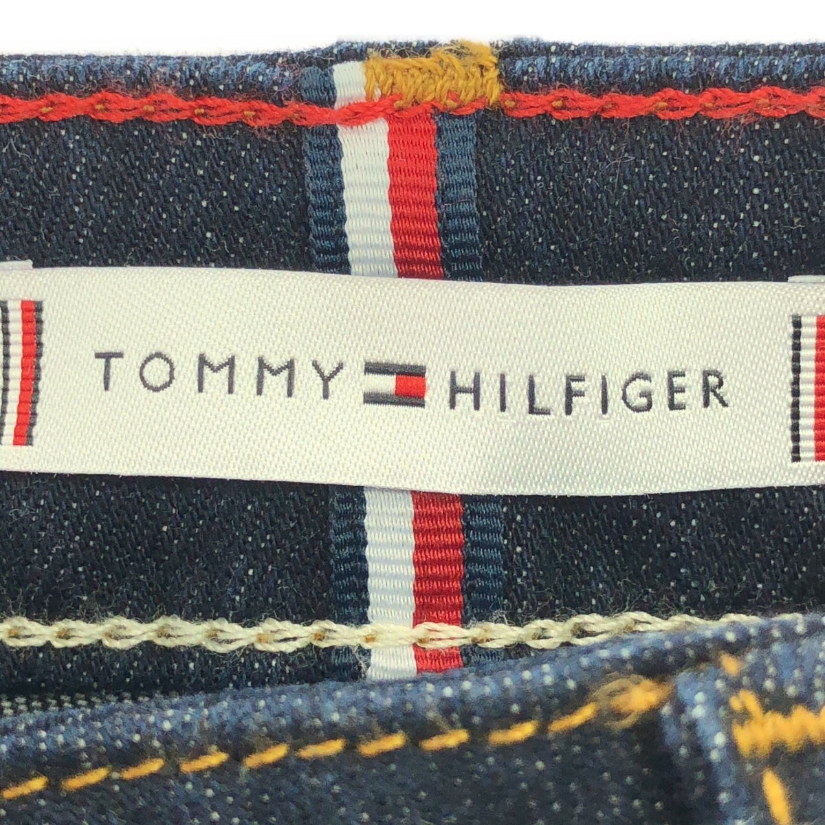 TOMMY HILFIGER | organic cotton / leather patch dark blue denim pants | size 27 | indigo | women's