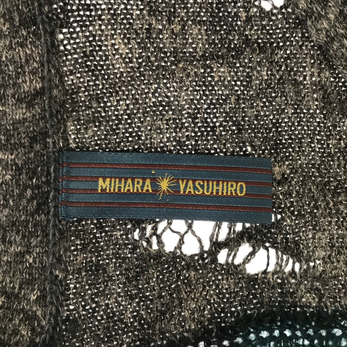 MIHARA YASUHIRO / MIHARA YASUHIRO | Bordered distressed asymmetrical V-neck knit cardigan |