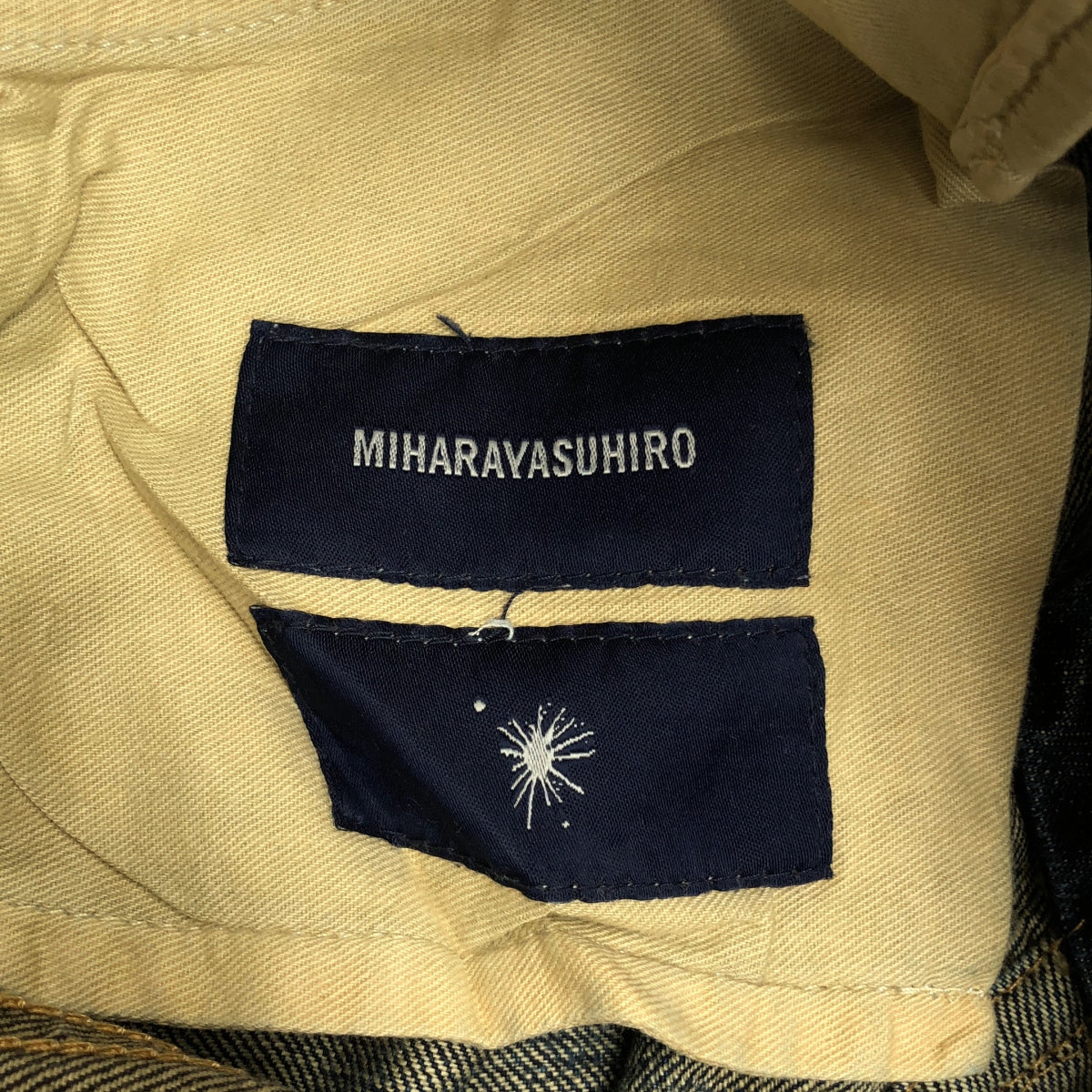 MIHARA YASUHIRO | Vintage-finished, cinch-back cropped denim pants | 46 | Indigo/Black | Men's