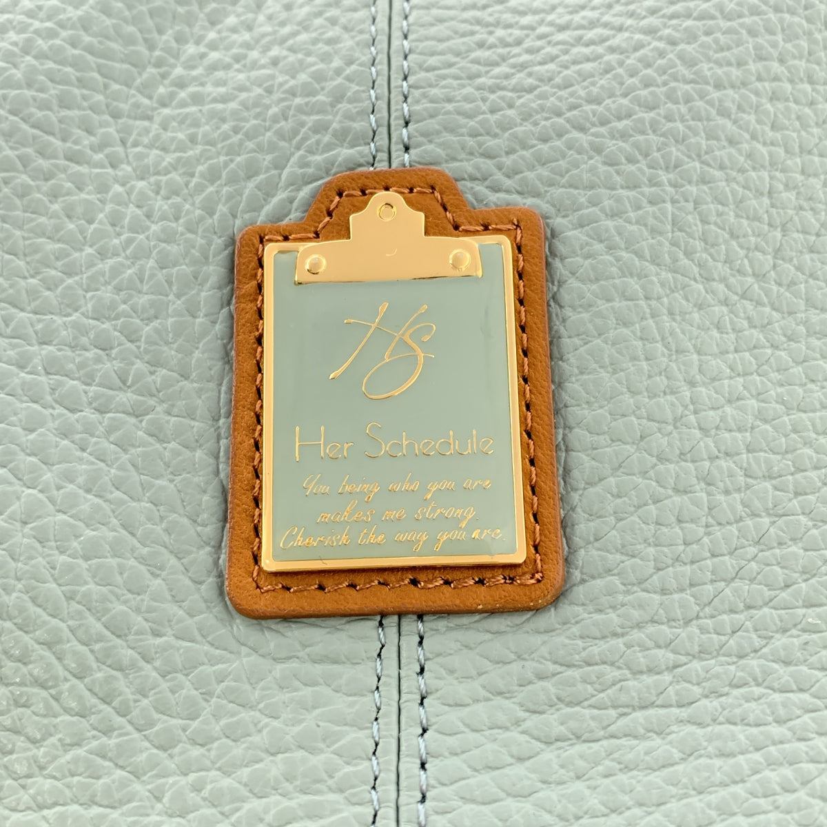 她的日程表 | 帶有標誌的雙向單肩包和 0 秒背包 |