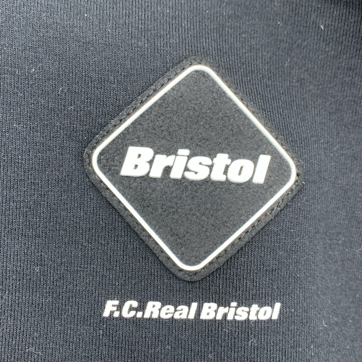 FCRB / FC Real Bristol | 2024 秋冬系列 | x UNDER R 開幕慶典套裝：Tex 運動連帽衫與寬鬆長褲 | L 碼 | 黑色 | 男款