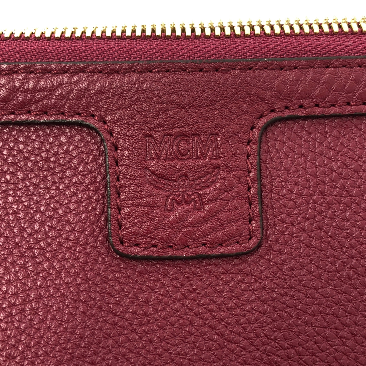 [狀況極佳] MCM | 兩用皮革手拿包 | 酒紅色 | 女款