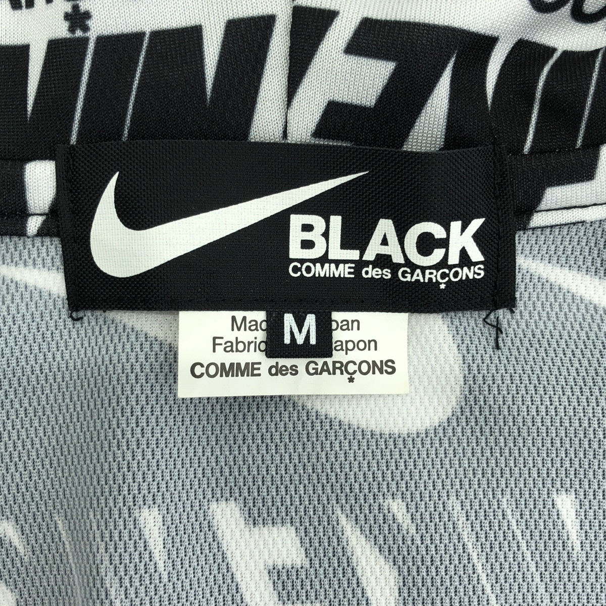 BLACK COMME des GARCONS / ブラックコムデギャルソン | 2019AW / AD2019 | NIKE LOGO ZIP PARKA ロゴ総柄 ポリエステル ジップパーカー | M | ブラック / ホワイト | メンズ