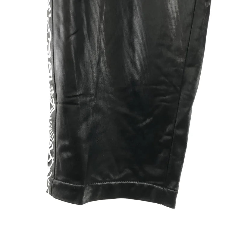 JUNYAWATANABE COMMEdesGARCONS MAN / 준야와타나베 맨 | 2023SS | × Keith Haring / 키스 해링 사이드 로고 드로스트링 이지 팬츠 | L | 남성