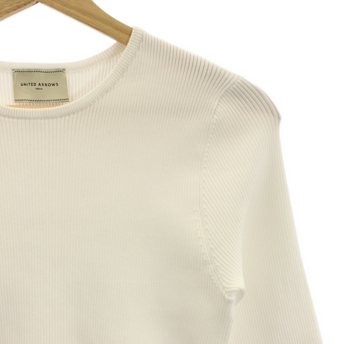 【美品】  UNITED ARROWS / ユナイテッドアローズ | Pペプラムニット リブ プルオーバー | F | ホワイト | レディース