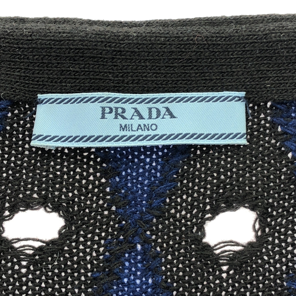 PRADA | 2011 | Argyle distressed V-neck cardigan | 40 | Women's