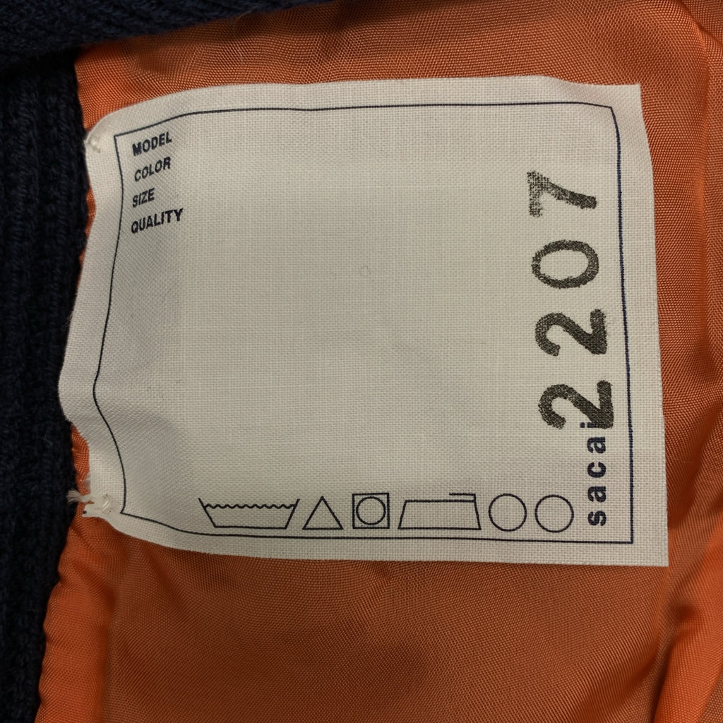 sacai | 混紡針織毛衣，飾有珠寶點綴、側開衩和 MA-1 對接圖案