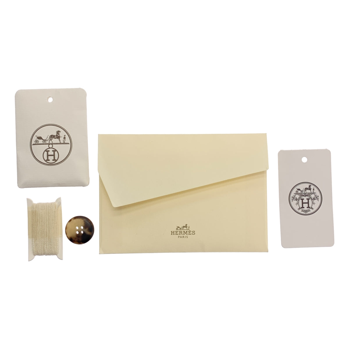 [新品] 愛馬仕 | 羊毛和羊絨針織衫，配肩扣和羊絨鏈圖案 | 38碼 | 象牙色 | 女款