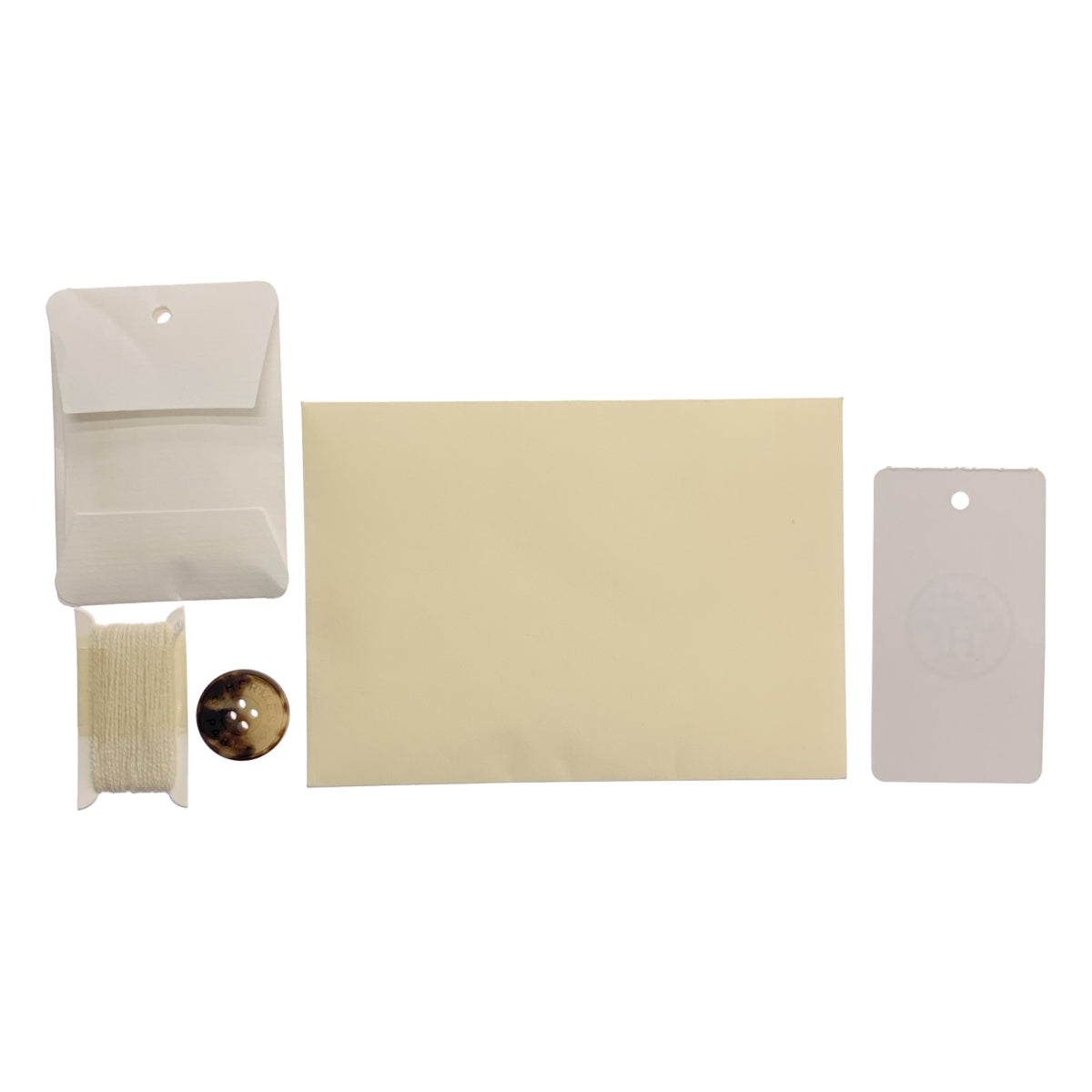 [新品] 愛馬仕 | 羊毛和羊絨針織衫，配肩扣和羊絨鏈圖案 | 38碼 | 象牙色 | 女款