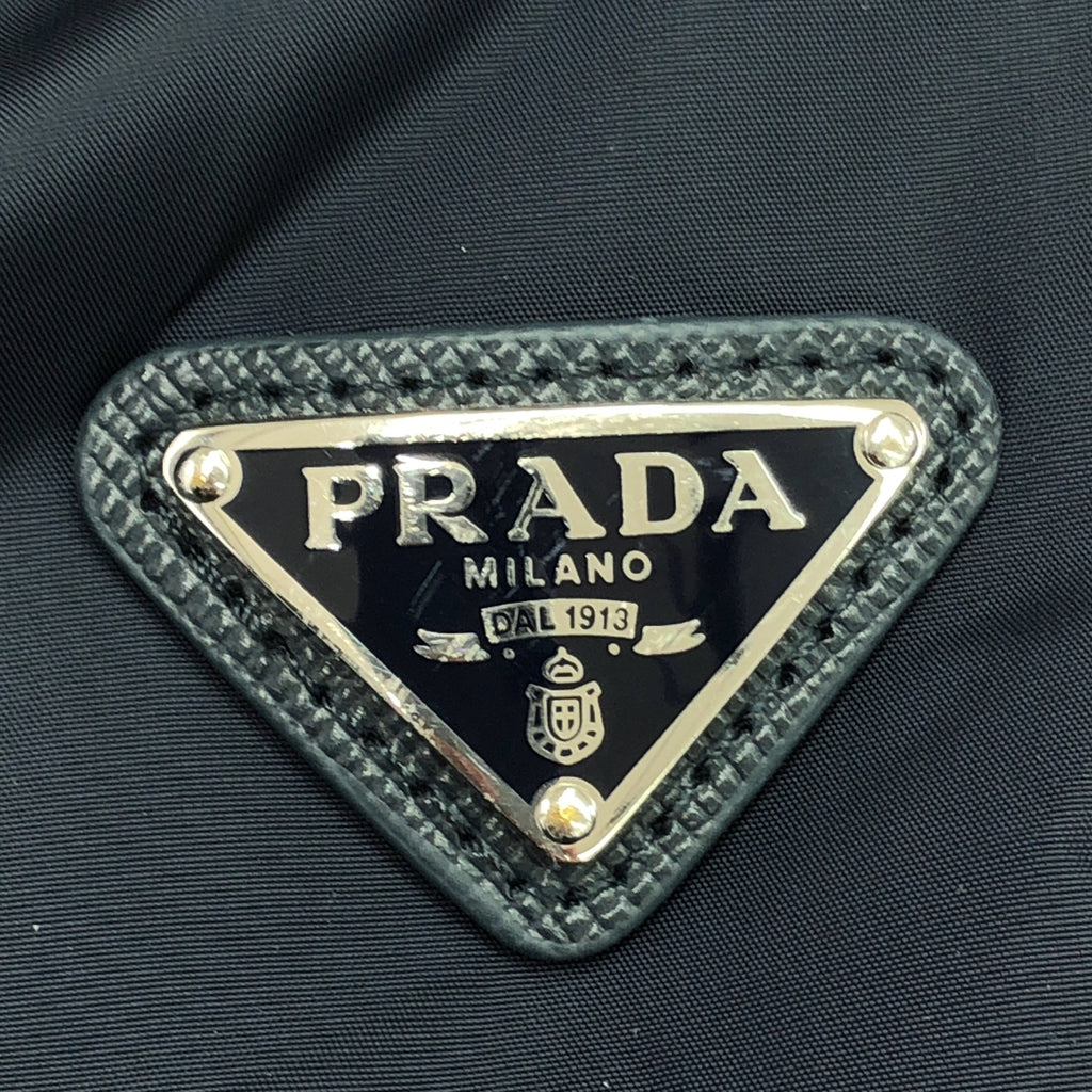 [狀況良好] PRADA | 2021 | 三角形標誌尼龍羽絨外套 | 40碼 | 海軍藍 | 女款