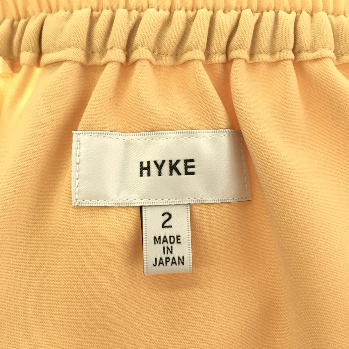 美品】 HYKE / ハイク | 2023SS | STRETCH TAPERED PANTS テーパードパンツ | 2 | イエロー | – KLD