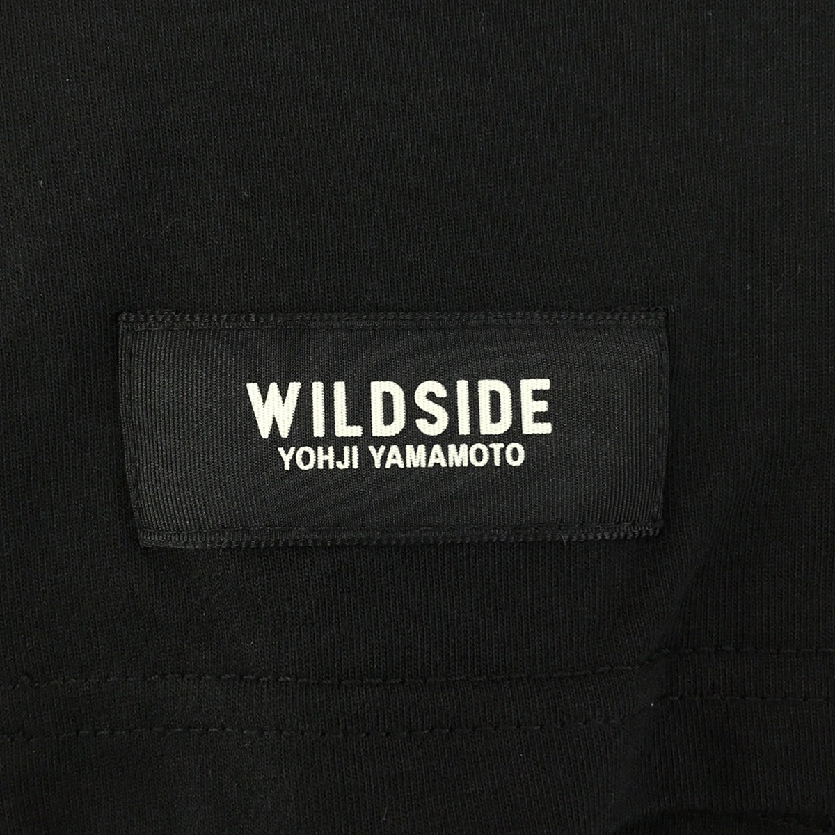 【미품】 FCRB / 에프시 레알 브리스톨 | 2023AW | × WILDSIDE YOHJI YAMAMOTO / 와일드 사이드 요우지야마모토 L / S TEAM EMBLEM TEE / 백 프린트 컷소우 | S | 블랙 | 남성