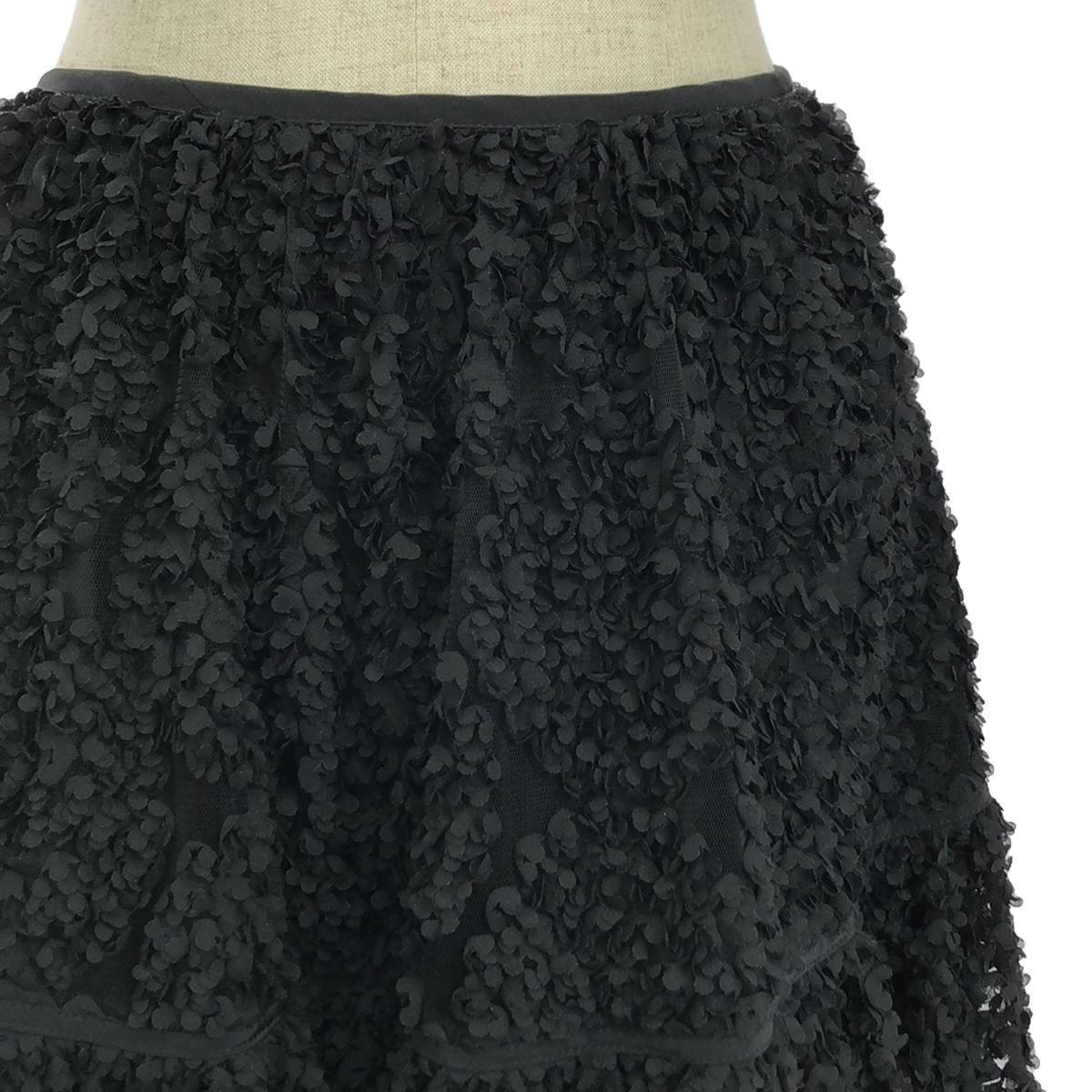 OBLI | 3D Flower Back Ribbon Skirt | 1 | Black | Women's