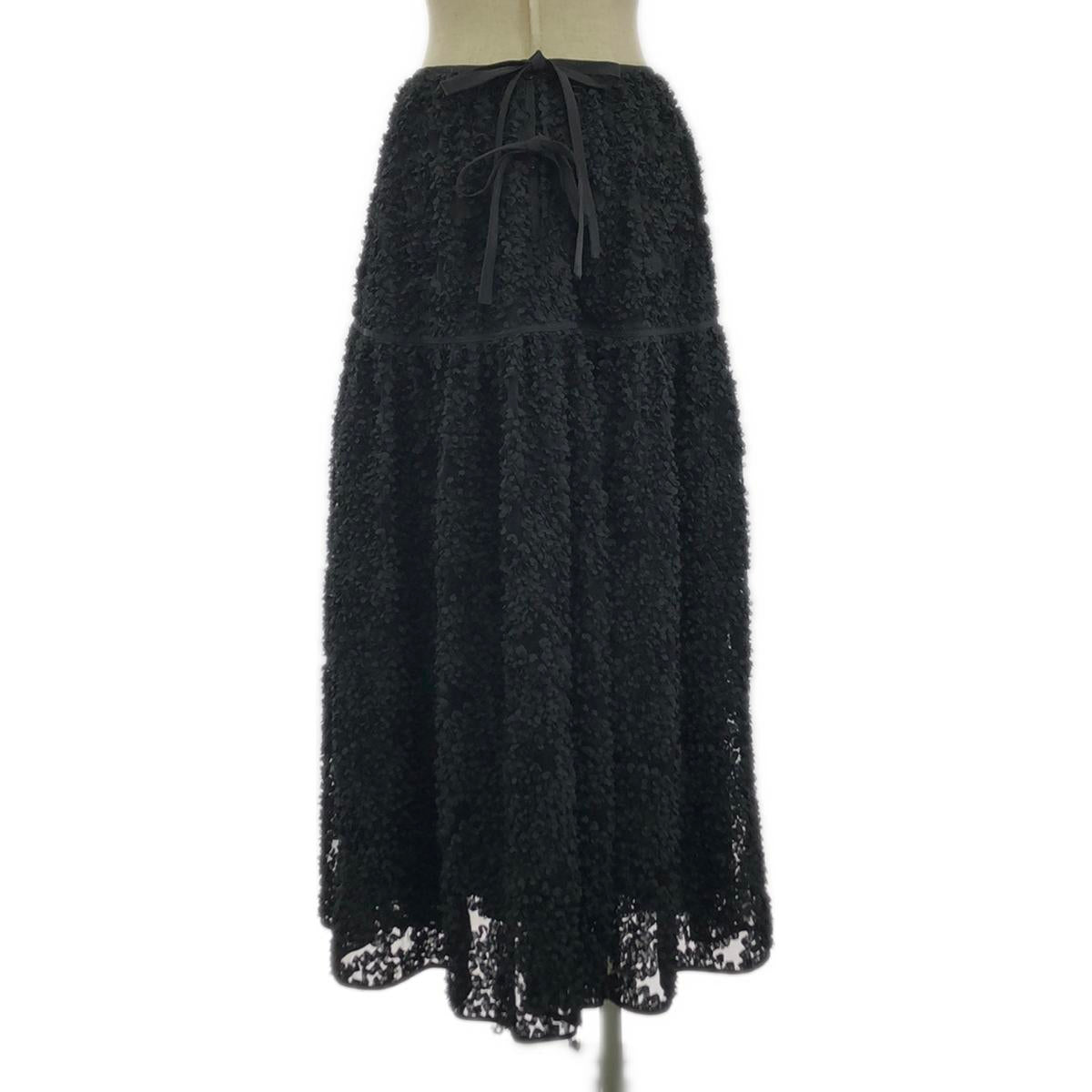 OBLI | 3D Flower Back Ribbon Skirt | 1 | Black | Women's