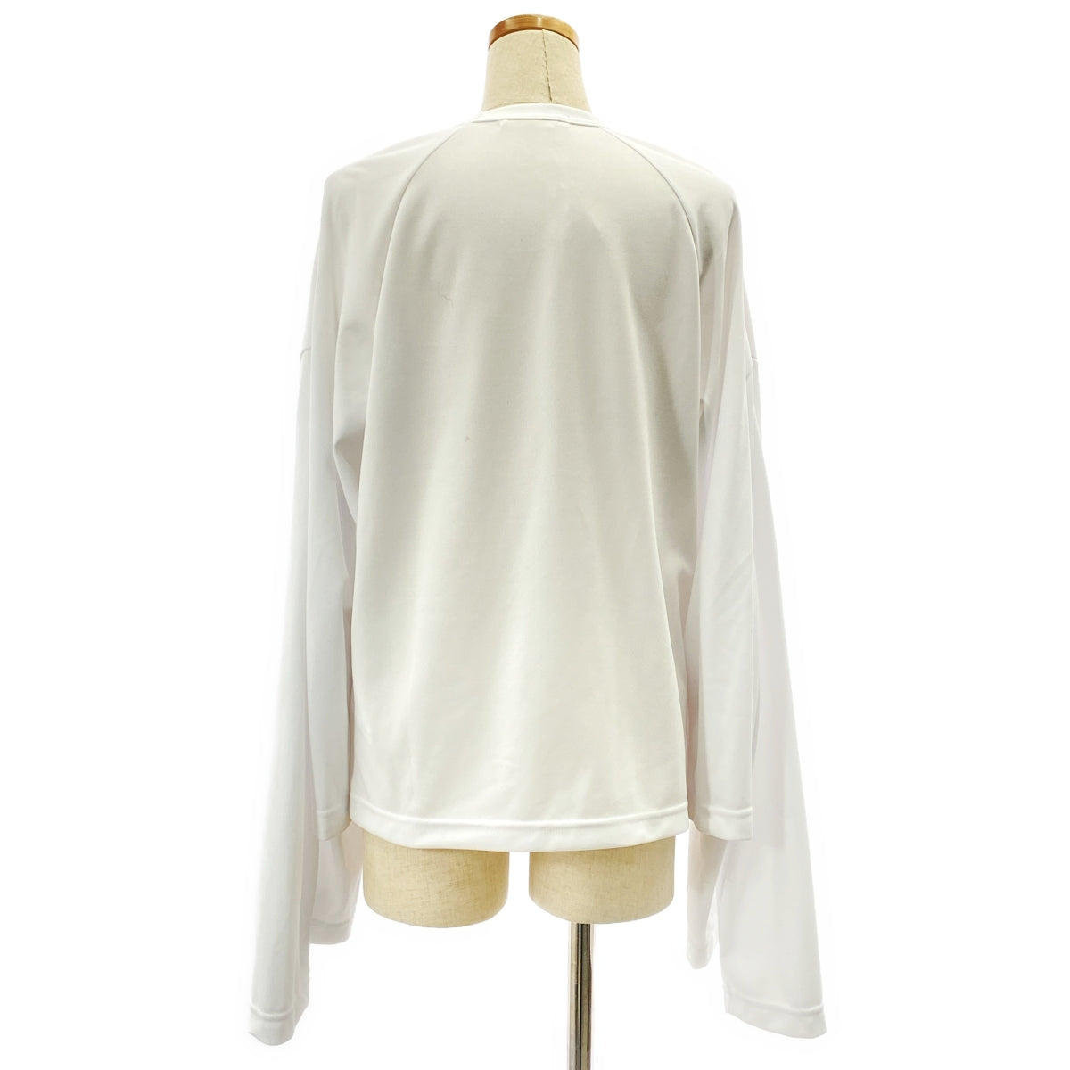 [狀況極佳] COMME des GARÇONS | 2025 春夏 | 聚酯不對稱袖上衣 | S尺寸 | 白色 | 女款