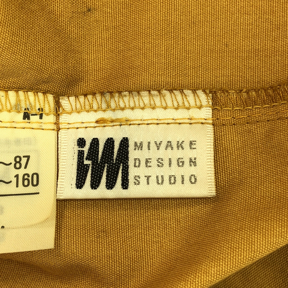 im MIYAKE DESIGN STUDIO / 三宅一生設計工作室 | 80 年代復古標誌印花高領長款大衣 | M | 棕色 | 女款