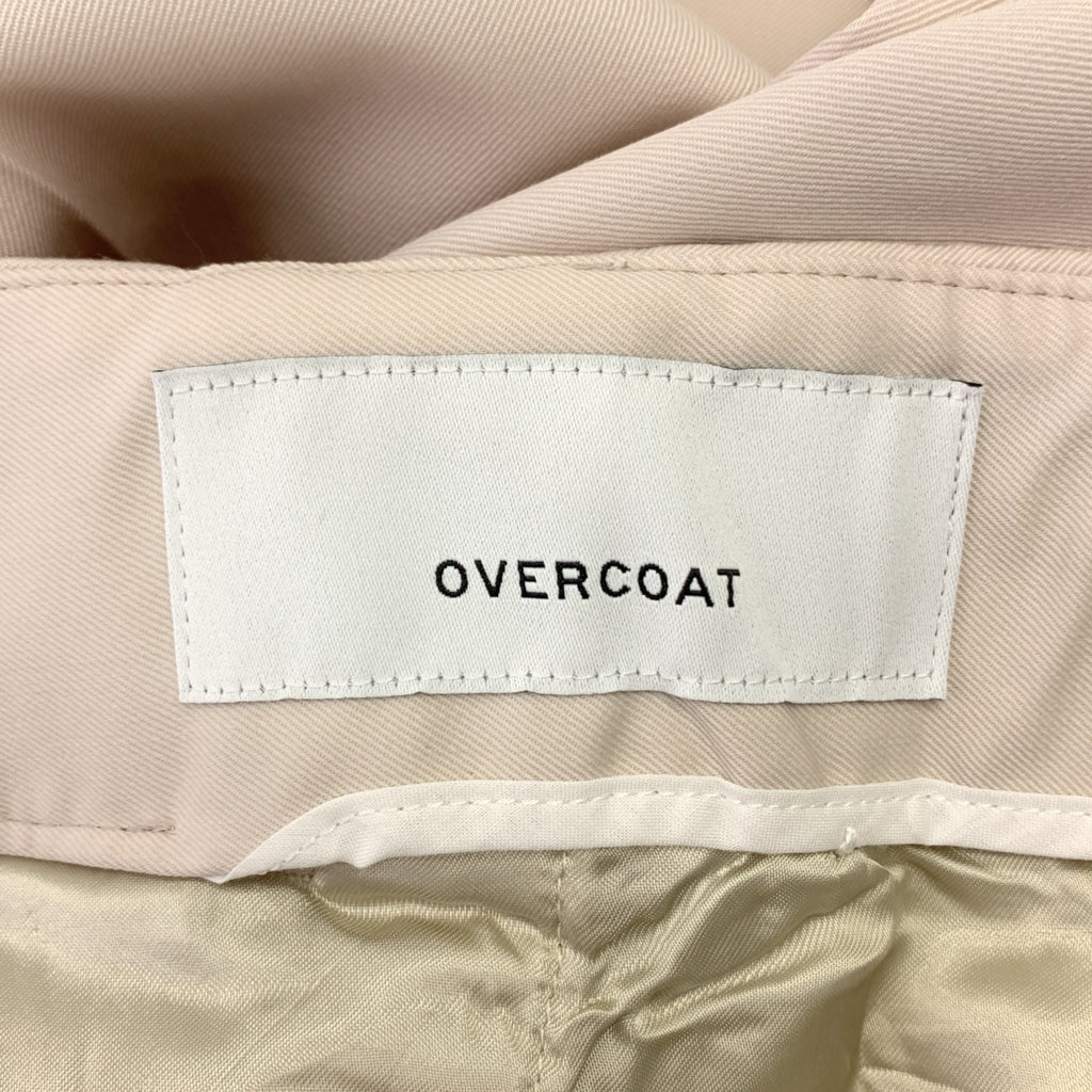 OVERCOAT / 오버코트 | 백 웨스트 고무 테이퍼드 슬랙스 팬츠 | 00 |