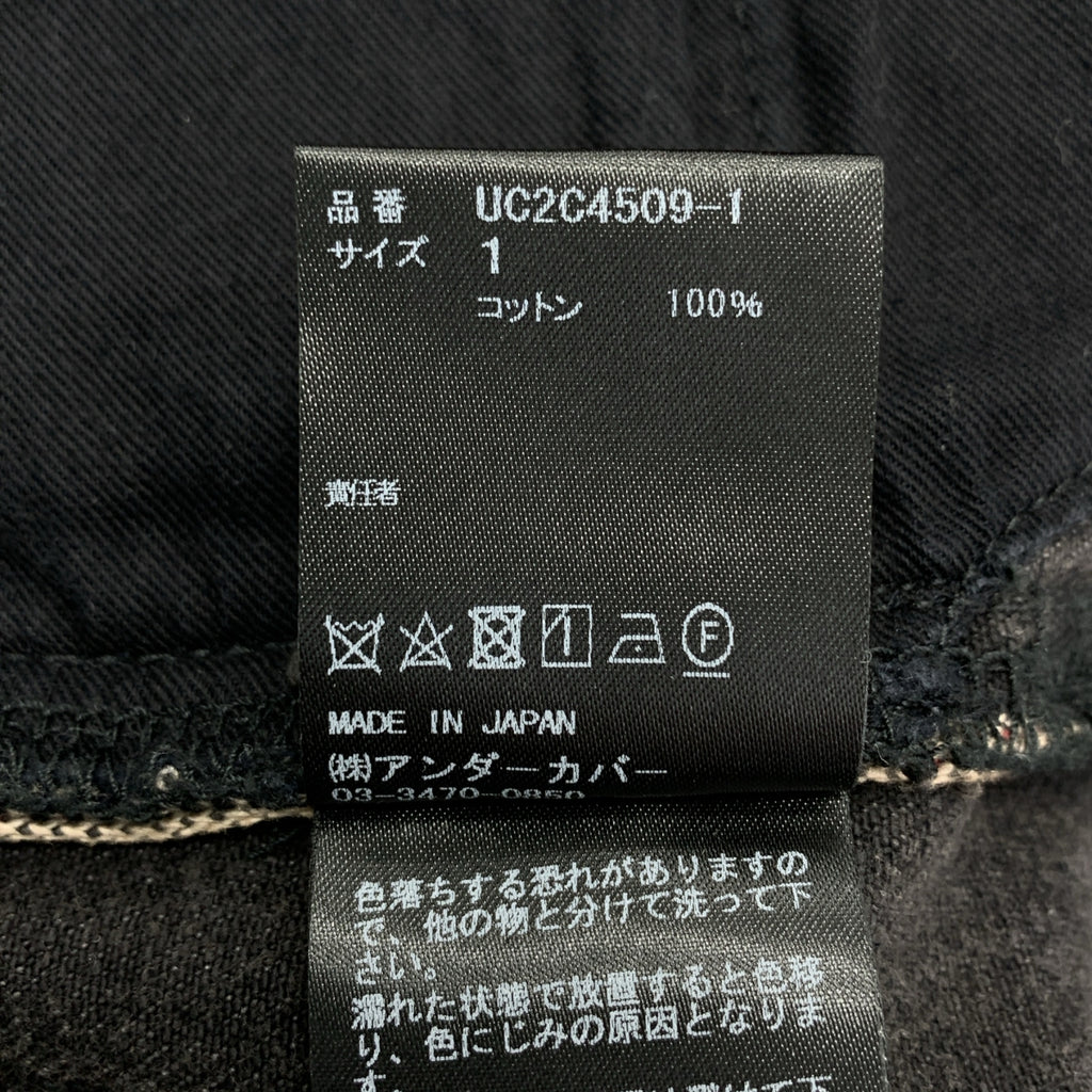 UNDER COVER / 언더 커버 | 2023AW | 드립 비즈 장식 가죽 로고 패치 세르빗치 블랙 데님 팬츠 |