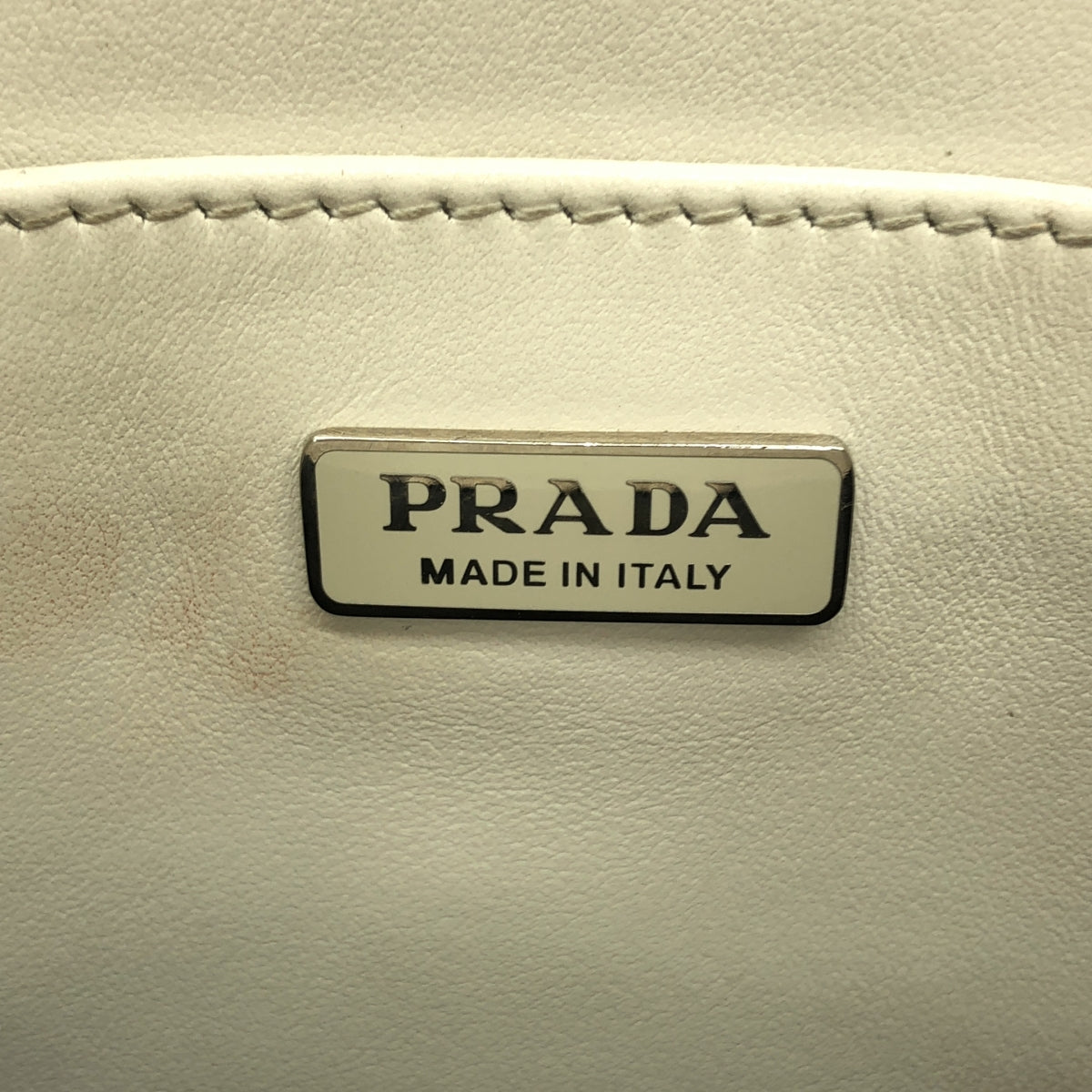 PRADA | 壓紋三角形標誌雙向單肩包 |