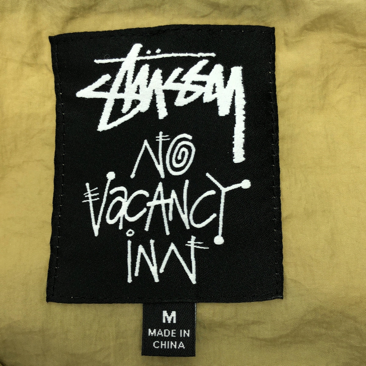 STUSSY | 尼龍後背標誌立領大衣 | M碼 | 米色 | 男款