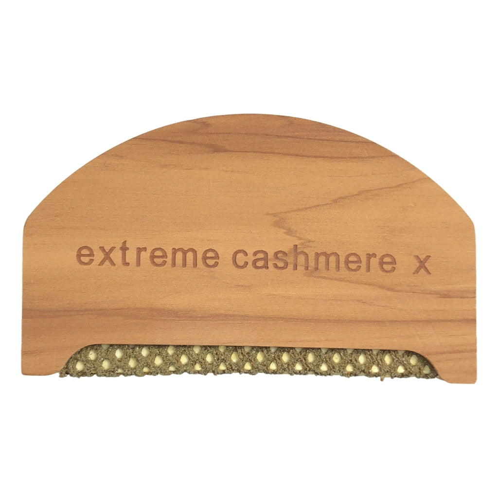 極致羊絨 | V領針織套頭衫 |