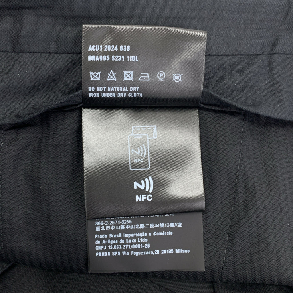 [狀況極佳] PRADA | 2024 | 中心壓印聚酯休閒褲 | 尺寸 44 | 海軍藍 | 男款