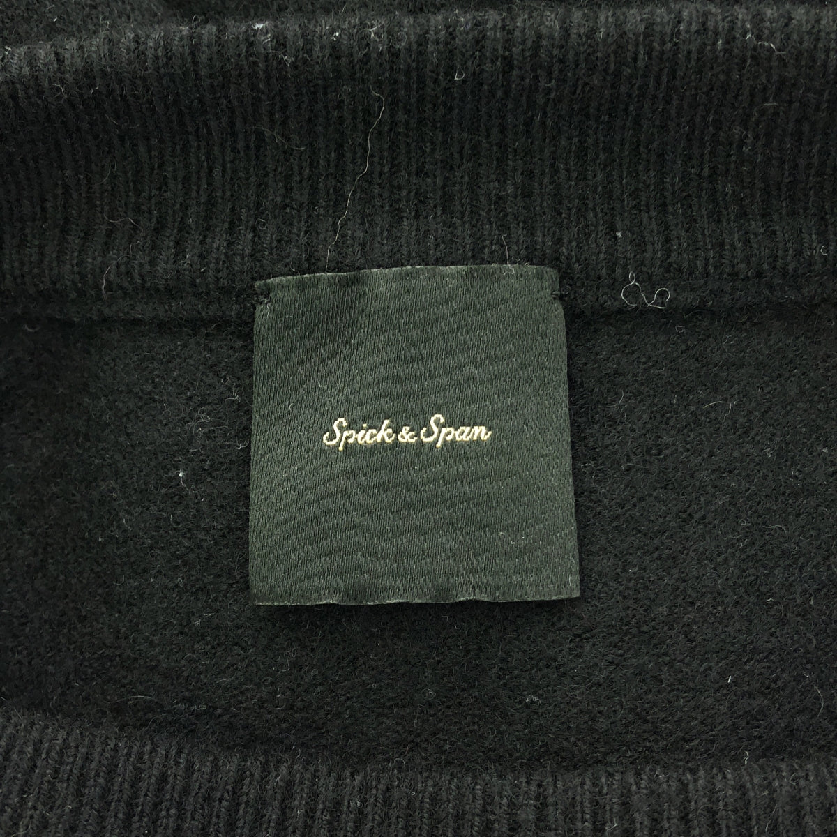 一塵不染 | ESSENCE 標誌針織 | F |黑色 |女性的